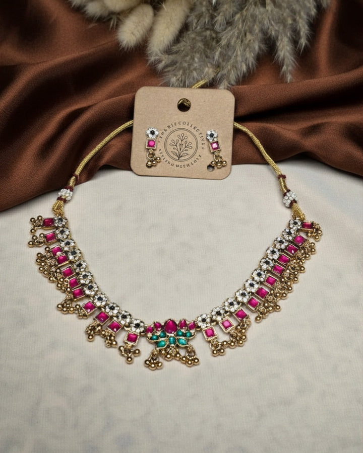 PINK STONE LOTUS CHARM